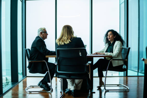 istock Coworkers talking on business meeting on office 2028295428
