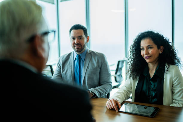 istock Coworkers talking on business meeting on office 2028295432