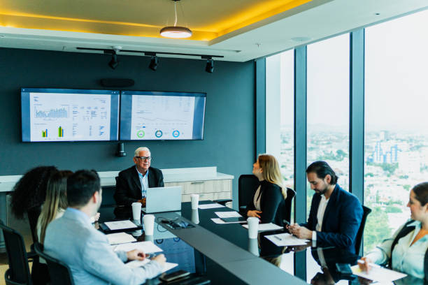 istock Coworkers talking on business meeting on office 2028306750