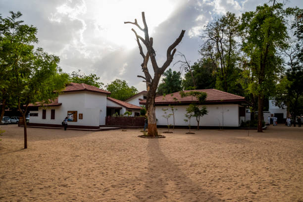 Sabarmati Ashram is located in the Sabarmati suburb of Ahmedabad, Gujarat, adjoining the Ashram Road, on the banks of the River Sabarmati, 4 miles from the town hall. This was one of the many residences of Mahatma Gandhi who lived at Sabarmati and Sevagram when he was not travelling across India or in prison.