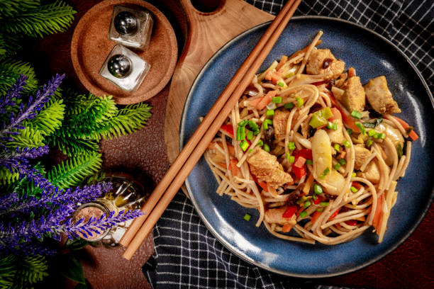 istock Fried noodles with chicken and vegetables. 2028312438