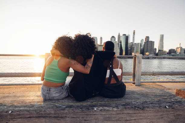 istock Three friends enjoying a cool sunset in New York 2028326055