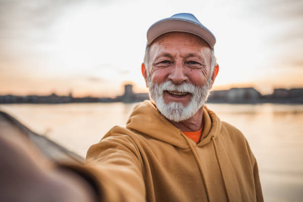 istock Senior man taking selfie after jogging 2028350600