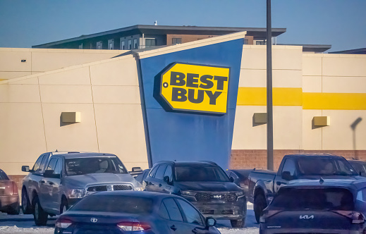 Calgary, Alberta, Canada. Feb 18, 2024.A Best Buy store sign at a store mall