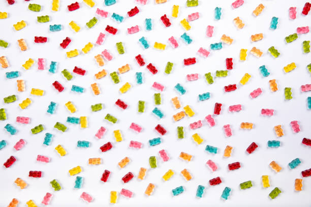 Colorful Gummy Bears Texture Background - Sweet Candy Delights on White