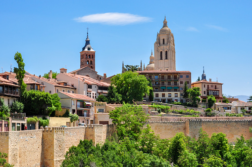 Segovia old town cityscape with medieval cathedral and town wall, Spain