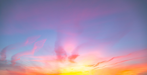 Summer sunrise red sky panorama with fleece clouds. Summer morning good weather background.