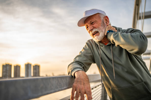 istock Senior Caucasian athlete has neck pain 2028498106