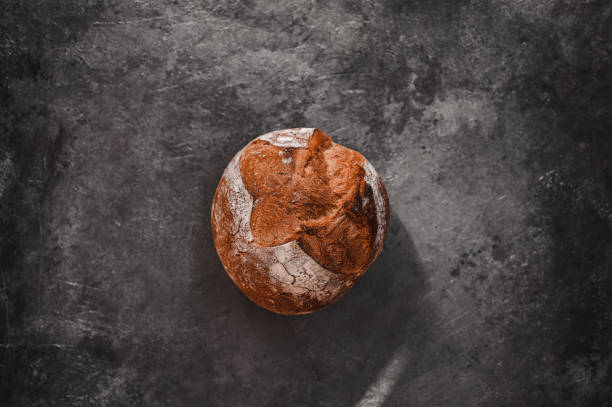 Homemade sourdough bread in a center of background.