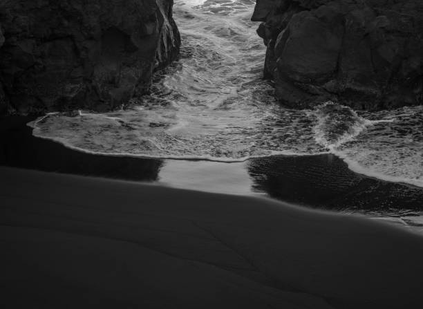 beach with black volcanic sand on  Tenerife
