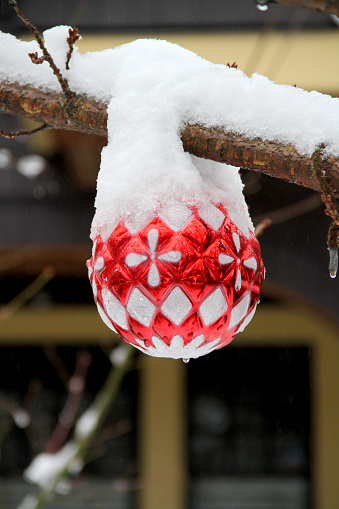 A Christmas ornament in deep winter.