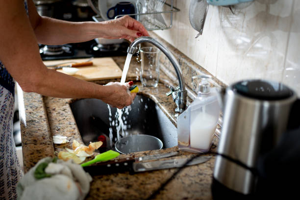 istock Pan being washed in the kitchen sink. 2028665915