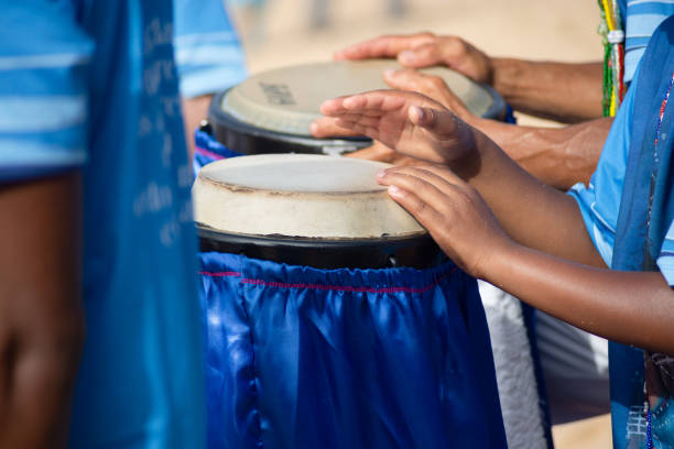 istock Hands playing atabaque. musical rhythm. African music. 2028666446