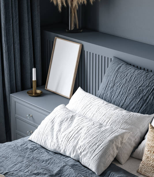 Frame mockup in cozy dark blue bedroom interior