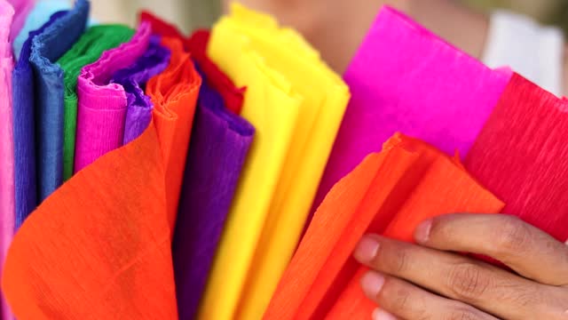 Vibrant Craft Papers in Assorted Colors. Stack of Bright Colored Handcraft material.
