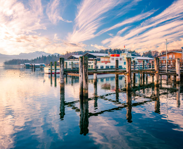 Boat harbor at Chiemsee lake, Germany, during sunrise.