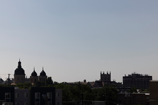 The outline of Canada's Parliament Buildings in Ottawa at dawn