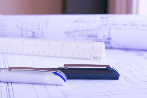 istock Blue and black Needle Rollerball Pens Fine Point on blue print 2028915491