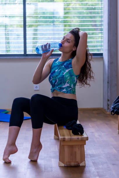 istock Ballerina getting ready in the rehearsal hall. 2028987402