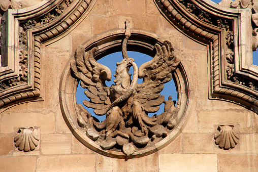 Architectural detail of the eagle devouring a snake of the Postal Palace in Mexico City