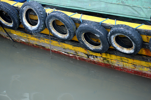 used tires on iron ships, as a barrier from friction