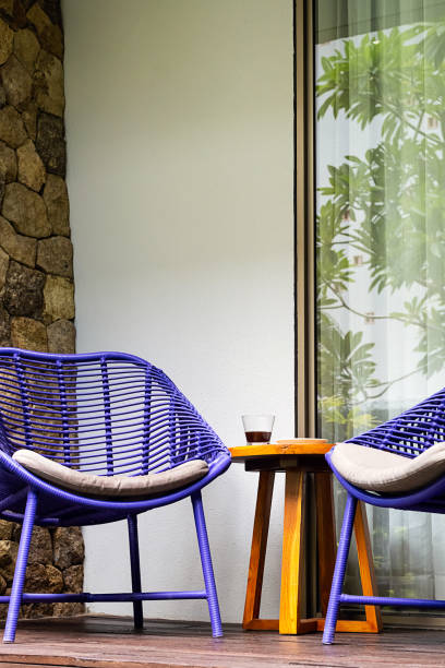 istock Summer lounge terrace. Patio area with two chairs and table. 2029068482