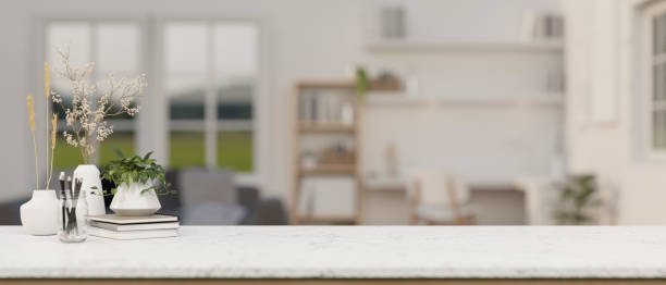 istock Empty space on a white tabletop with a blurred background of a contemporary living room. 2029179677