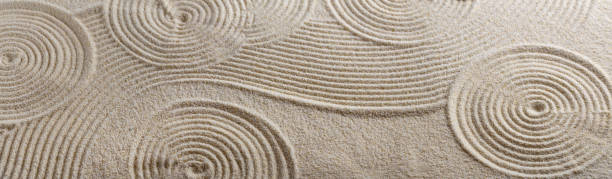 Zen garden Zen garden with the sand pattern and stones spiral rock stock pictures, royalty-free photos & images