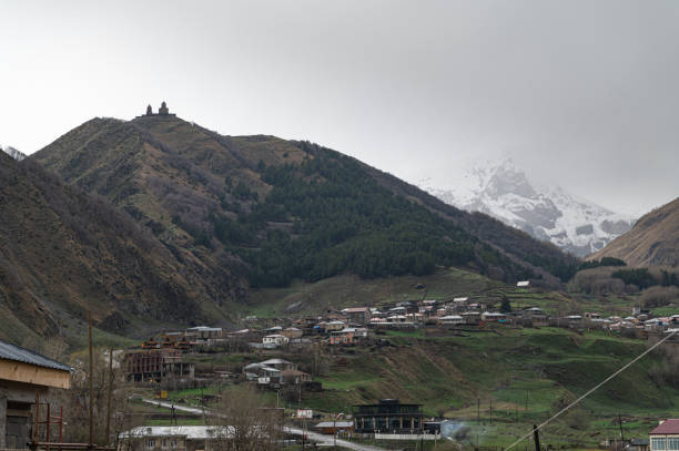 The Mountain along the way to Kazbergi. Beautiful view of the city of Mtskheta. stock photo