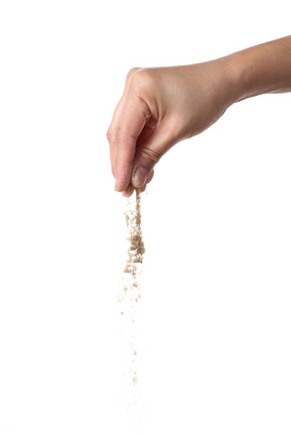 istock Hand holding ground pepper on white background 2029271203