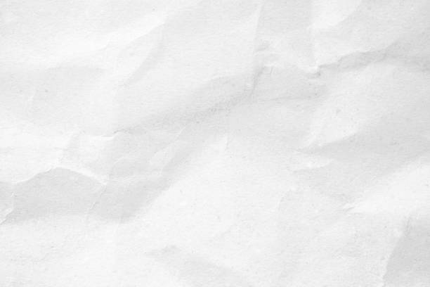 istock White recycled craft paper texture as background. Grey paper texture, Old vintage page or grunge vignette of old newspaper. Pattern rough art creased grunge letter. Hardboard with copy space for text. 2029280596