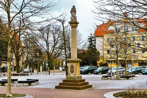 Jaslo, Poland - April 24, 2022: A beautiful monument in the center of Rynok Square.