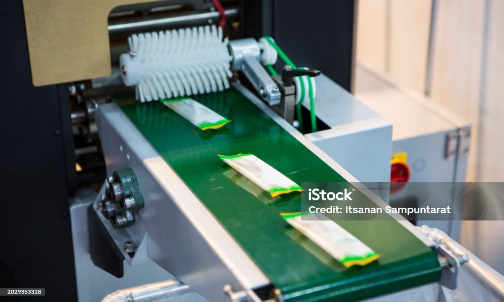 Automatic Food Wrapper Automatic Food Flow Wrapping Machine Stock Photo - Download Image Now ...