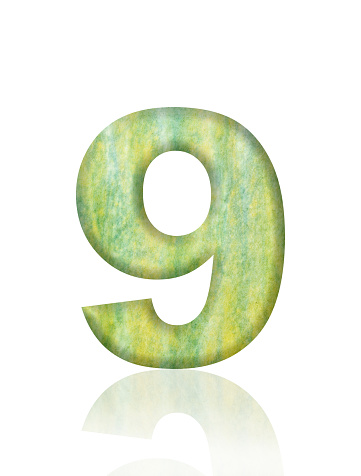 Close-up of three-dimensional Washi paper number 9 on white background.