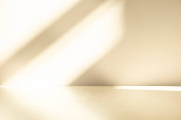 istock Wall interior background, studio and backdrops show products.with shadow from window color beige and white. background for text insertion and presentation product 2029367342
