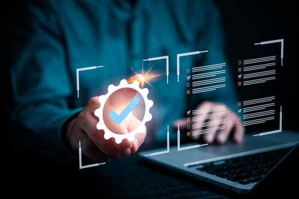 istock person holds a glowing check mark symbol, representing approval, confirmation, or successful verification of quality control. data business service assurance and marketing concept. 2029395118