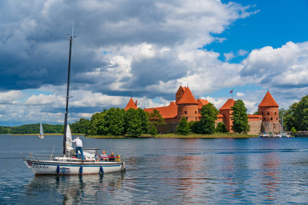 Trakai, Lithuania - July 10, 2017: Tourists visit Trakai Castle on beautiful sunny day