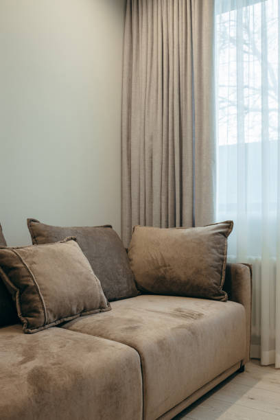 istock Close up brown pillows on sofa at living room 2029554754