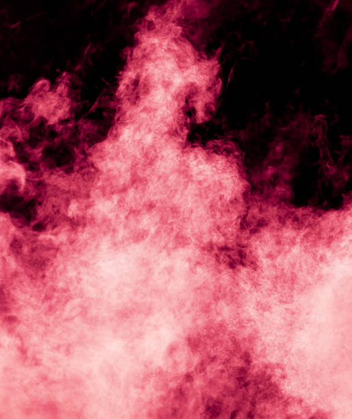 istock Red smoke isolated black background 2029563153