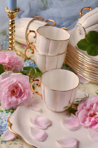 istock Still life with white dishes and roses 2029585206
