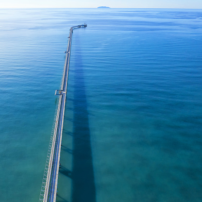 Aerial view of Talmadge Memorial Bridge on a sunny day. The Talmadge Memorial Bridge is a bridge spanning the Savannah River between downtown Savannah, Georgia, and Hutchinson Island.