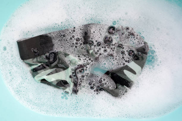 istock Men underwear soaked in water dissolved detergent with white foam bubble. Laundry concept 2029603956