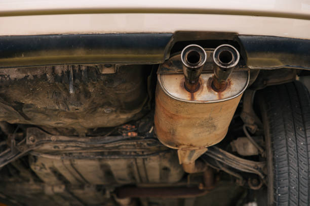 istock under car exhaust pipe muffler old aged rust rusty closeup auto part service 2029622414