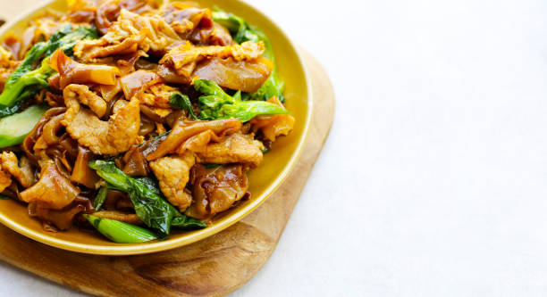 istock Stir-fried rice noodles with soy sauce and pork 2029631394