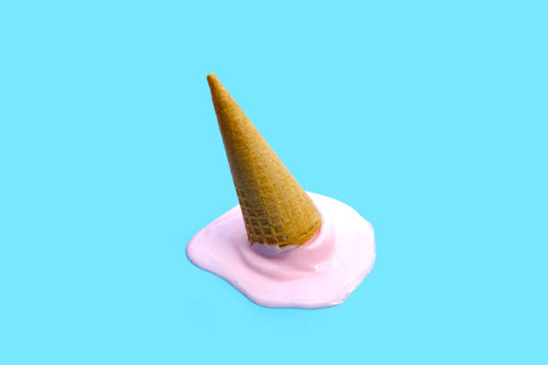 istock Melting ice cream with waffle cone on blue background. 2029637083