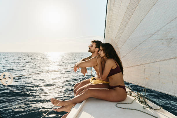 istock Young relaxed couple spending a summer day on a yacht. 2029642565