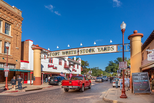 Fort Worth, USA - November 4, 2023: view to the brick architecture and Main street in Stockyards, the old cattle selling area of Fort Worth, USA.