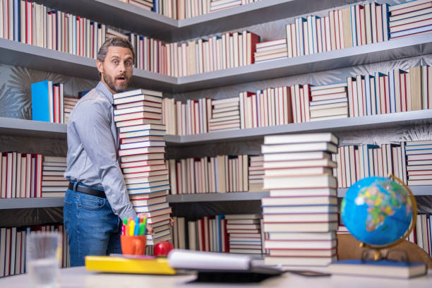 istock man get university education. school education with man teacher. education and knowledge. back to school. teachers day. teachers education in school. knowledge day. preparation foe exam 2029679851