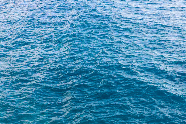 istock Blue water surface with small waves at sea 2029700878