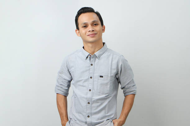 istock happy confident asian indonesian man on isolated background 2029719158